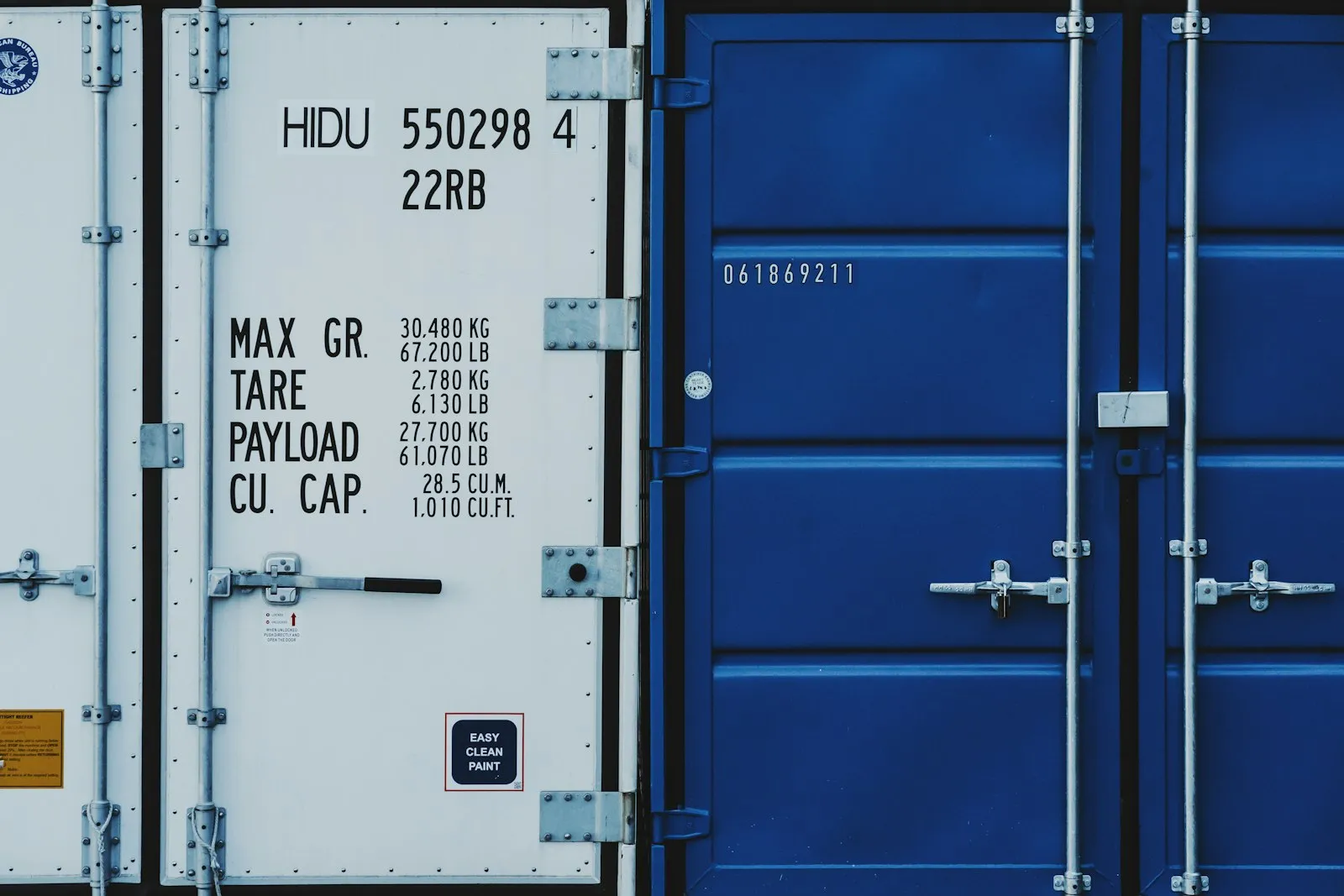 Blue and white sea containers stacked